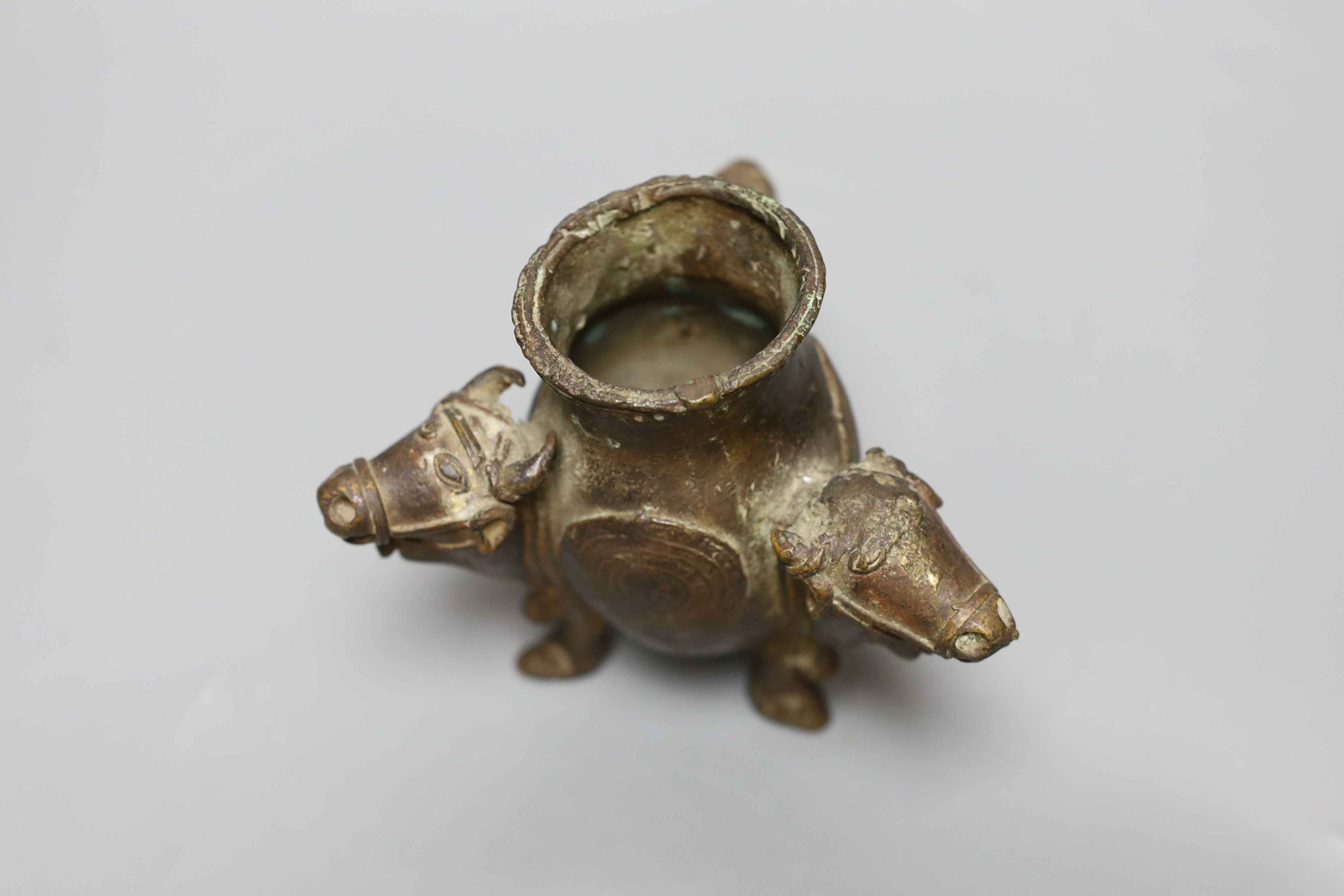 An Indian bronze ox monopdia vessel, 11cms high